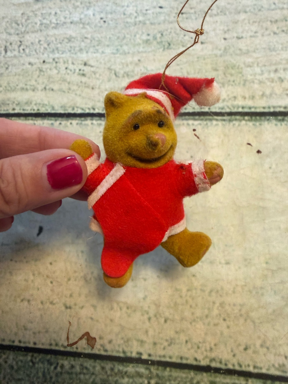 Vintage Winnie the Pooh flocked Santa ornament. Flaw